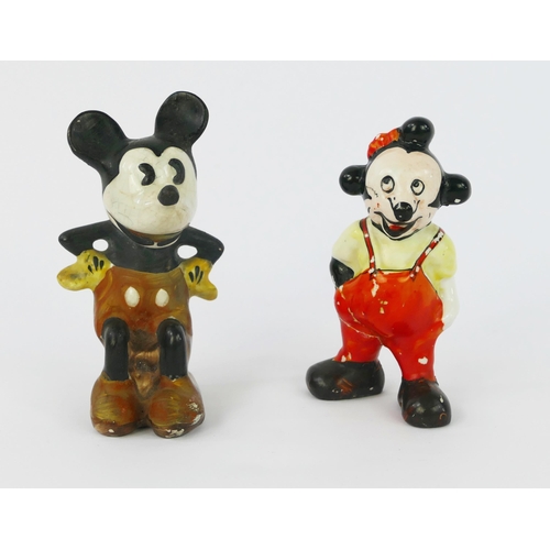 1105 - A Wade Heath figurine of Mickey Mouse, seated wearing orange shorts with hands on hips, 10cm high, (... 