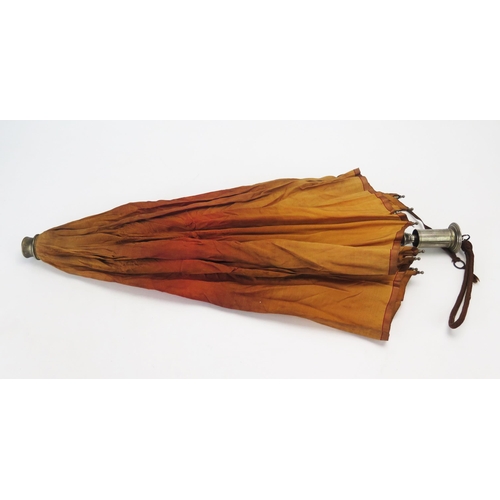 1118 - An early 20th century parasol, with orange silk canopy.