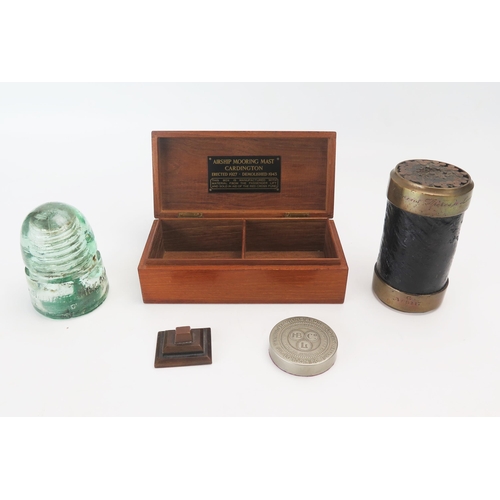 1129 - A mahogany box made from the airship mooring mast at Cardington, an underwater telegraph cable, a Ca... 