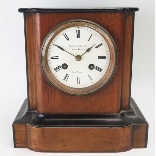 1137 - An Edwardian mahogany and ebony cased mantel clock, of rectangular outline, with 9.5cm Roman dial, t... 