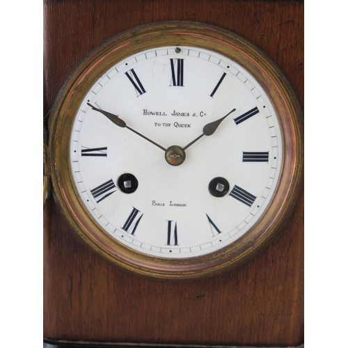 1137 - An Edwardian mahogany and ebony cased mantel clock, of rectangular outline, with 9.5cm Roman dial, t... 