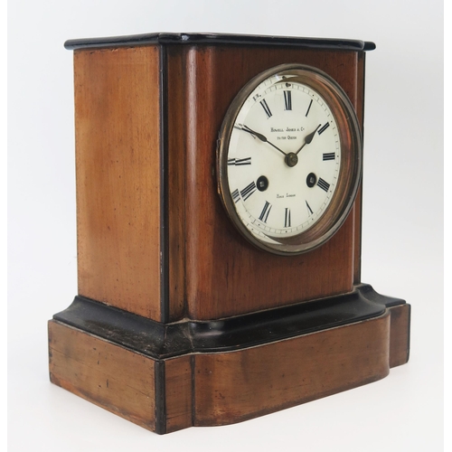 1137 - An Edwardian mahogany and ebony cased mantel clock, of rectangular outline, with 9.5cm Roman dial, t... 