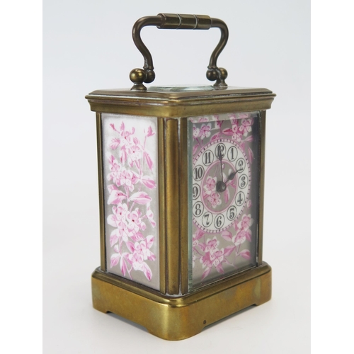 1138 - A late 19th century French brass miniature carriage timepiece with silvered and floral decorated Ara... 