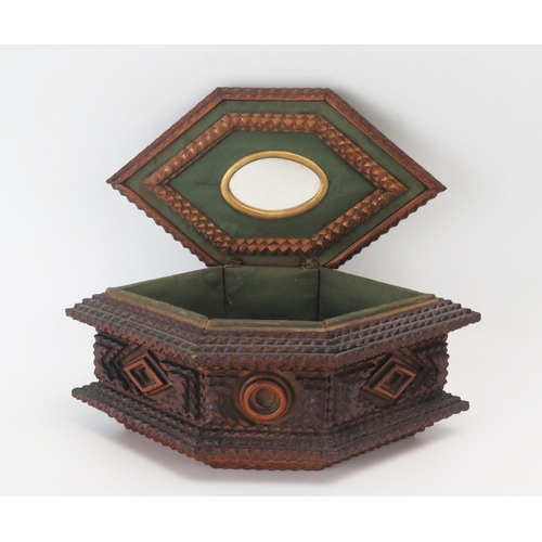 1139 - A tramp art casket of lozenge-shaped outline, the hinged lid enclosing an oval mirror panel and mate... 