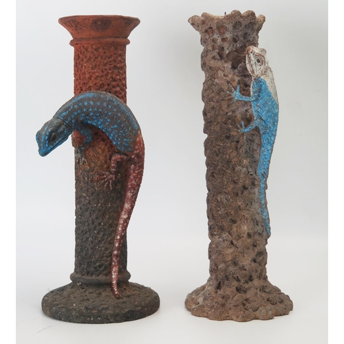 1143 - Two terracotta candlesticks decorated with clinging lizards, 30cm high