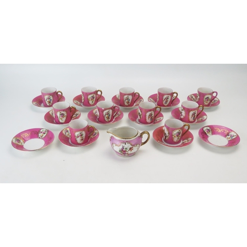 1151 - A part set of eleven assorted pink porcelain coffee cans and saucers, together with a cream jug,