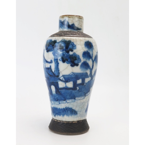 1154 - A Chinese Porcelain Blue and White crackle Glazed Vase decorated with buildings and figures on a bri... 