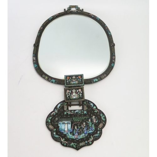 1159 - A Chinese metal and enamel hanging wall mirror, with ovoid bevelled mirror plate, with enamel floral... 