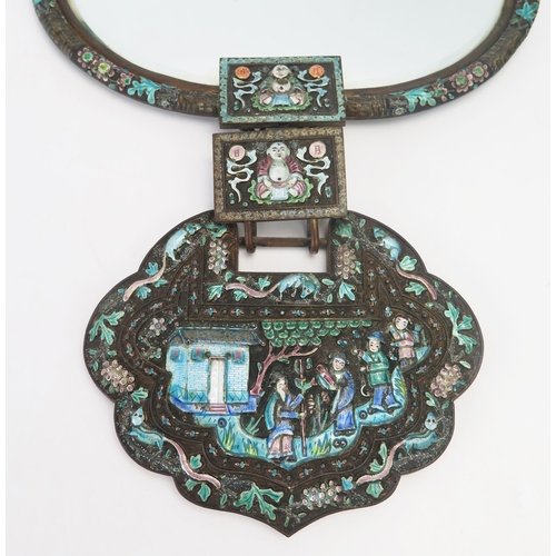 1159 - A Chinese metal and enamel hanging wall mirror, with ovoid bevelled mirror plate, with enamel floral... 