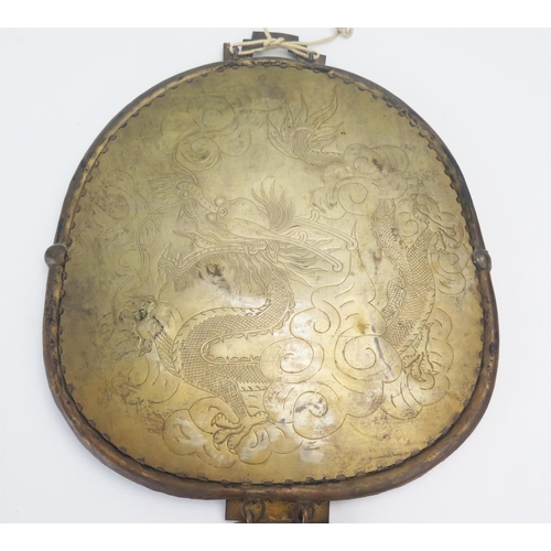 1159 - A Chinese metal and enamel hanging wall mirror, with ovoid bevelled mirror plate, with enamel floral... 