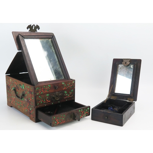 1167 - A Chinese wood and hardstone inlaid dressing box, The hinged lid with mirror plate containing three ... 