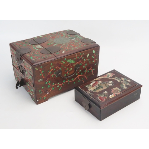 1167 - A Chinese wood and hardstone inlaid dressing box, The hinged lid with mirror plate containing three ... 