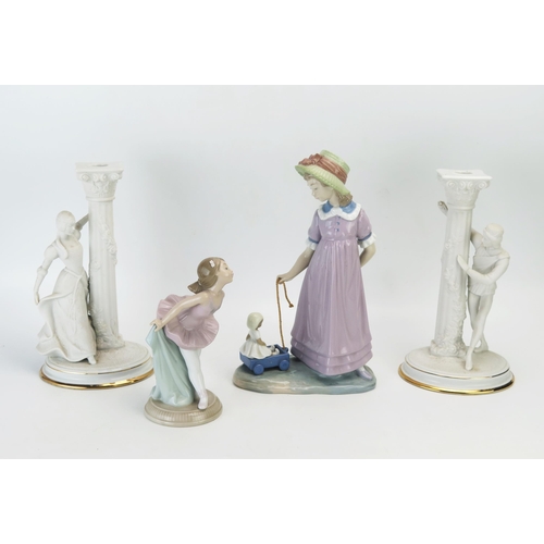 1171 - A pair of Franklin Mint bisque porcelain candlesticks modelled as Romeo and Juliet, 25cm high, toget... 