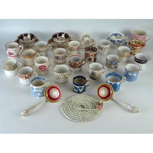 1172A - A collection of 19th century porcelain coffee cans, cups and saucers, various factories.