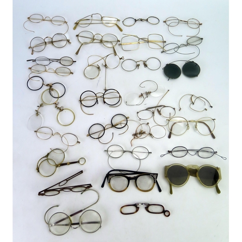 1181 - A collection of assorted 19th century and later spectacles and spectacle frames.