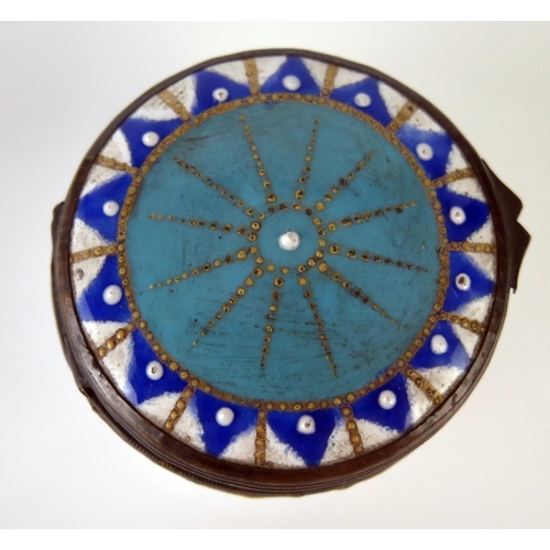 1188 - A 19th century enamel circular patch box, with hinged lid having geometric decoration, 4.5cm diamete... 