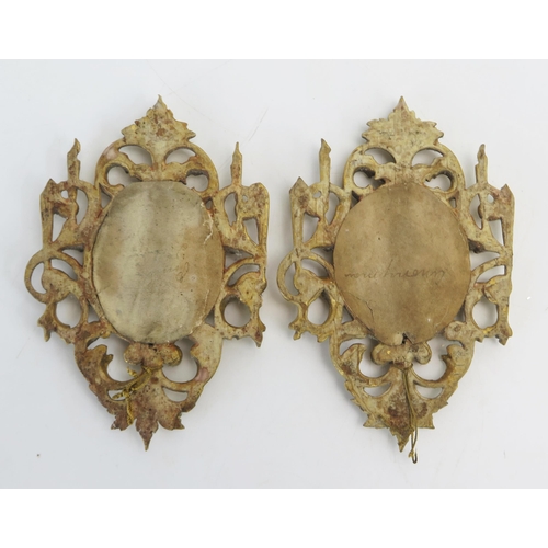 1192 - A pair of Florentine gilt wood oval frames, with foliate crests and scroll decoration.15cm high,