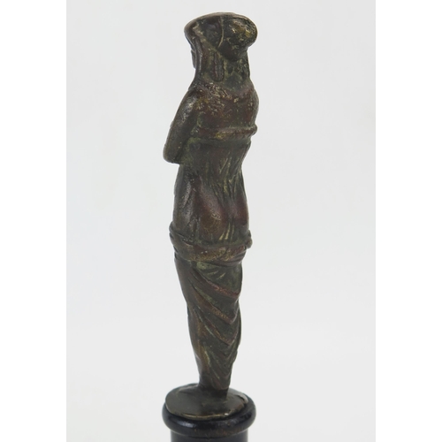 1195 - A Grand Tour bronze of a Roman woman, in long flowing robes, mounted on an ebonised base, 23cm high.