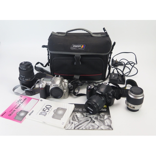 1242 - Nikon D40 & D50 Digital Cameras with AF Nikkor 28-80mm, DX 18-55mm, Sigma DC 55-200mm lenses - both ... 