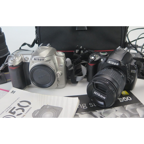 1242 - Nikon D40 & D50 Digital Cameras with AF Nikkor 28-80mm, DX 18-55mm, Sigma DC 55-200mm lenses - both ... 