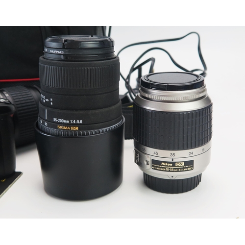 1242 - Nikon D40 & D50 Digital Cameras with AF Nikkor 28-80mm, DX 18-55mm, Sigma DC 55-200mm lenses - both ... 