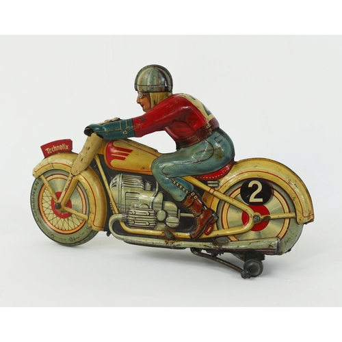 1246 - Technofix G.E. 255 Tinplate Clockwork Motorcycle with rider, in white with red detailing, RN 