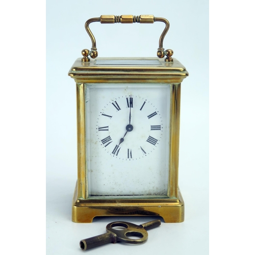 1278 - A French brass carriage timepiece (Not running) together with a 1902's mahogany mantel clock.