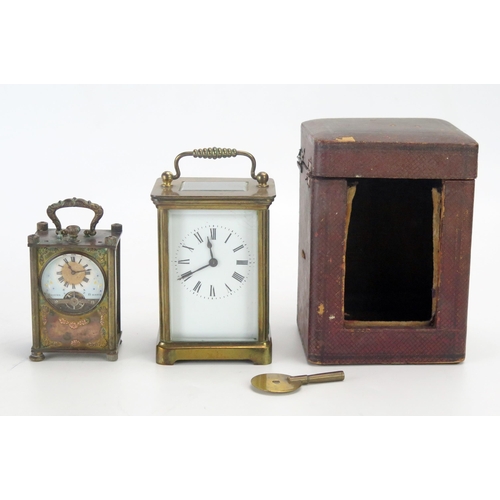 1280 - A French brass carriage timepiece contained in a travelling case, a smaller brass timepiece, both no... 