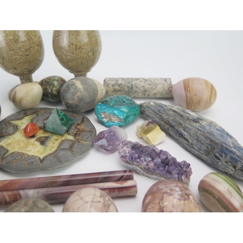 1284 - A collection of polished stone goblets, geode slices, polished stone eggs, and geological specimens.