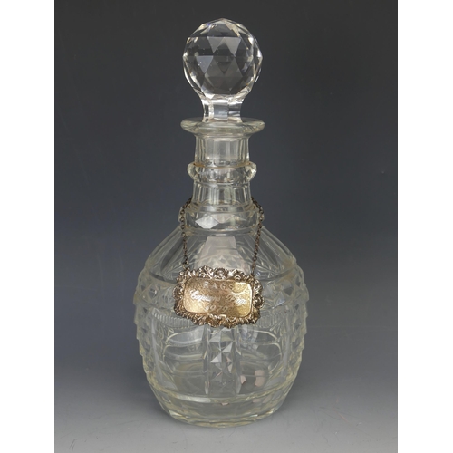 1294A - A Cut Crystal Decanter with a silver label