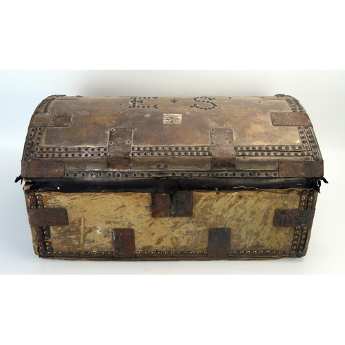 1311 - A hide and metal mounted domed travelling trunk, with  initials E S to the hinged lid and  loop carr... 