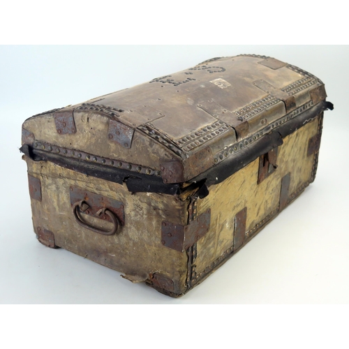 1311 - A hide and metal mounted domed travelling trunk, with  initials E S to the hinged lid and  loop carr... 