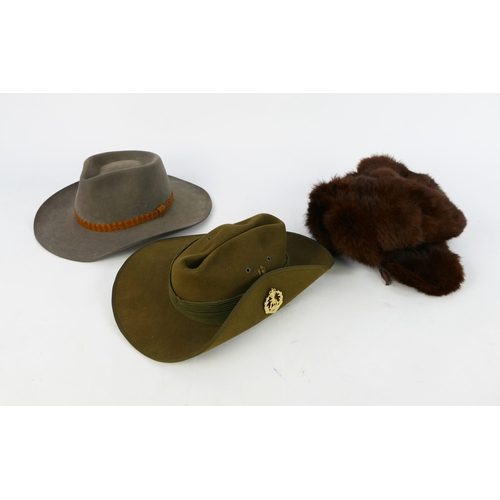 1328 - A Royal Australian Regiment slouch hat, a Russian simulated fur hat and an Akubra Snowy River Outbac... 