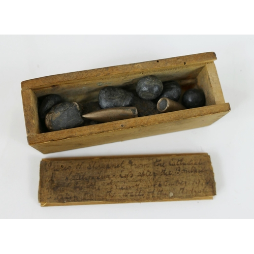 1335 - A World War One Princess Mary Christmas box, a piece of shrapnel from H M S Barham, Battle of Jutlan... 