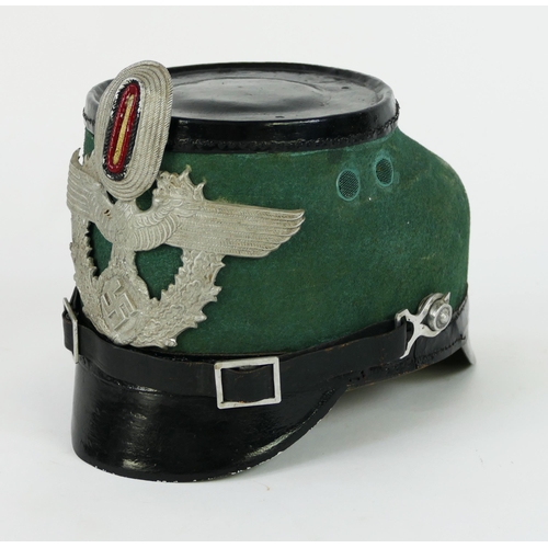 1345 - A Third Reich period police NCO's shako, of traditional design