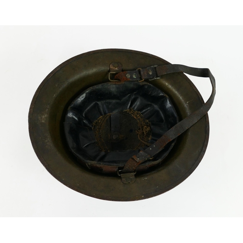 1346 - An American World war One steel helmet with liner.