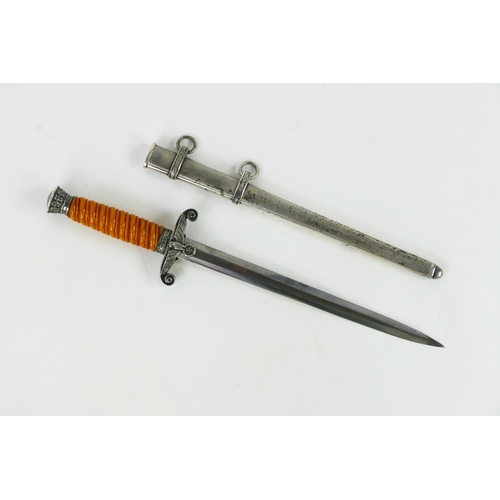 1361 - A World War II period German Army Officers Dagger, with 25cm blade by C. Eickhorn, with orange cellu... 