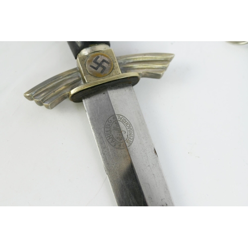 1363 - A Third Reich D.L.V. dagger, with 17.5cm blade by E & A Helbig, having turned down cross guard, leat... 