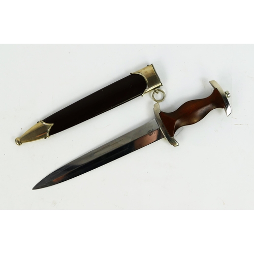 1365 - A Third Reich period SA dagger, with 22cm bladed etched with motto and RZM M7/33, having a wood grip... 