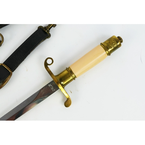 1368 - A Polish M52 Naval dagger, with 22cm steel blade No 30762, with brass quillion pink celluloid grip a... 