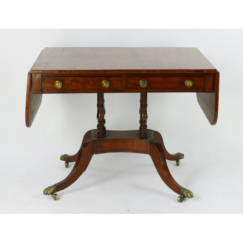 1421 - A 19th century mahogany sofa table, the rectangular top with hinged leaves above a pair of frieze dr... 