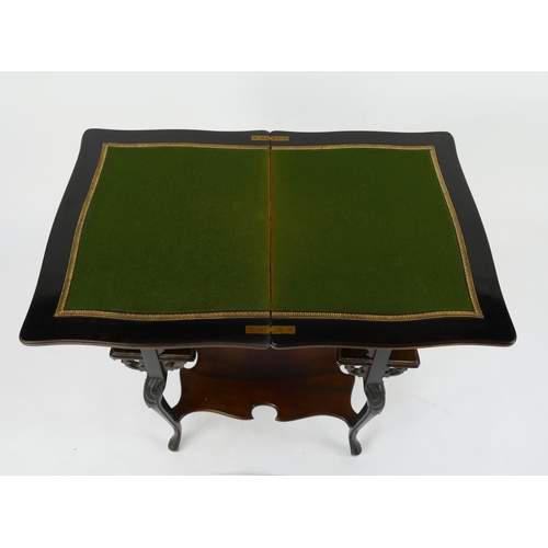 1423 - An Edwardian mahogany card table, the hinged top with a moulded edge, raised on four swept legs link... 