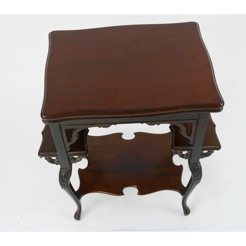 1423 - An Edwardian mahogany card table, the hinged top with a moulded edge, raised on four swept legs link... 