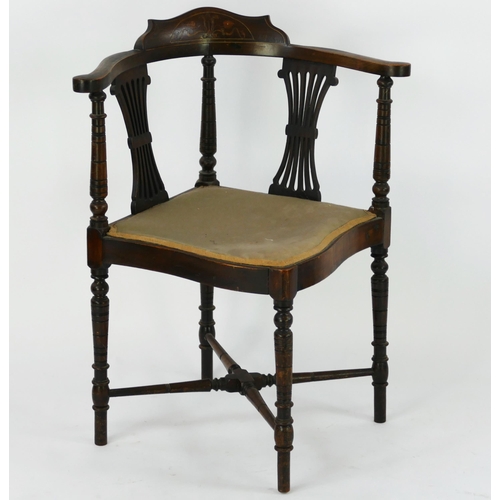 1443 - A late Victorian mahogany and inlaid corner chair, on turned underframing.