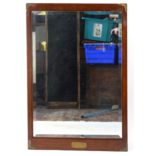 1444 - A mahogany and brass bound wall mirror with rectangular bevelled mirror plate, 90 x 61cm