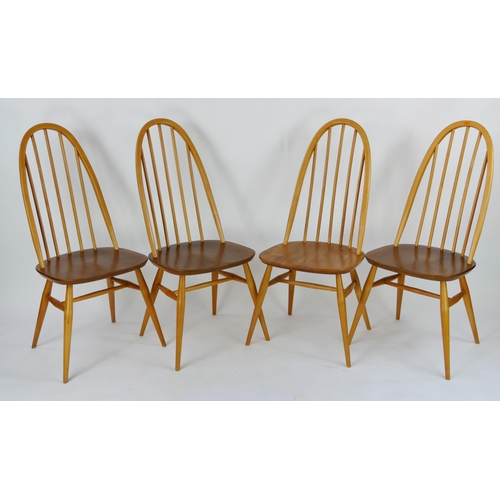 1454 - A set of four Ercol Quaker dining chairs with arched spindle backs above solid seat on turned legs. ... 