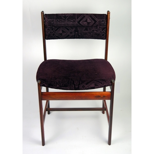 1462 - A set of eight Danish rosewood dining chairs, with padded curved top rail, with stuff over seat on o... 