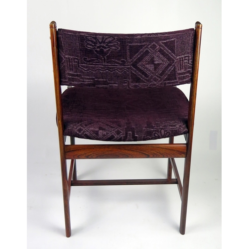 1462 - A set of eight Danish rosewood dining chairs, with padded curved top rail, with stuff over seat on o... 