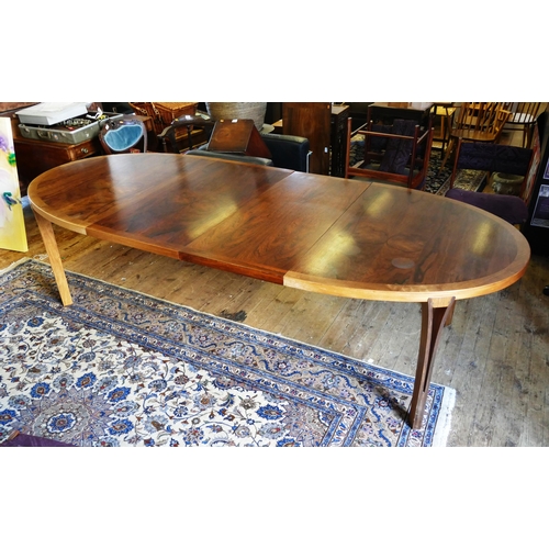 1463 - Danish circa 1960's rosewood modernist extending dining table by designer Sven Ellekaer for Heltborg... 