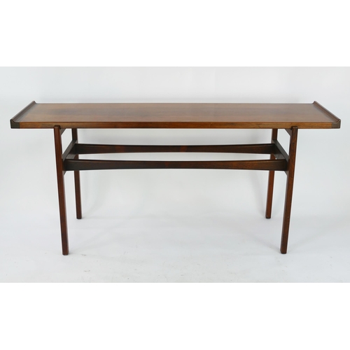 1465 - A Danish rosewood side table by Finn Juhl for Vodder, the rectangular top with swept ends, raised on... 